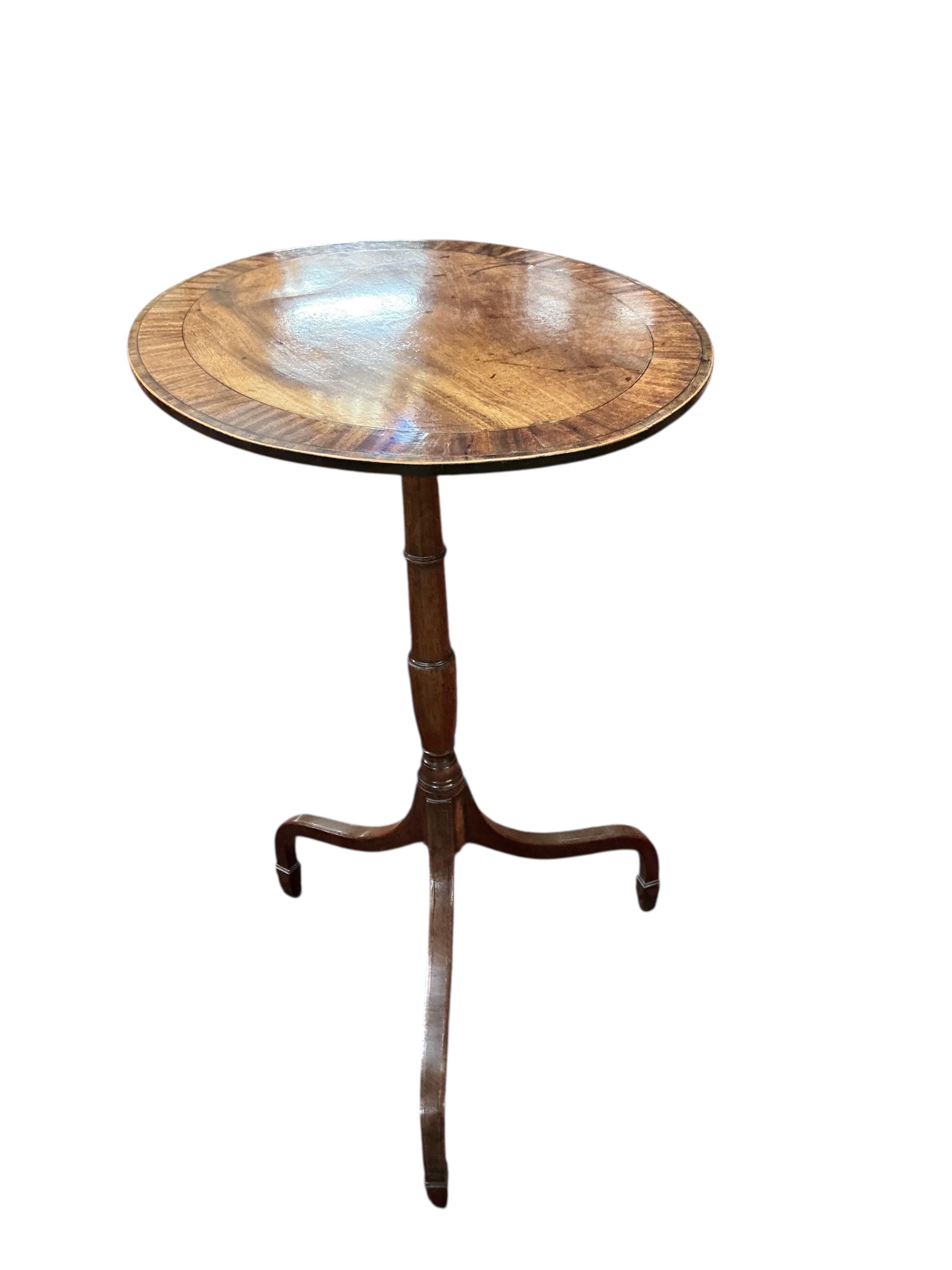 A George III banded mahogany oval tripod wine table, width 52cm, height 76cm